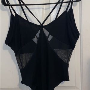 Black/ see through body suit $10